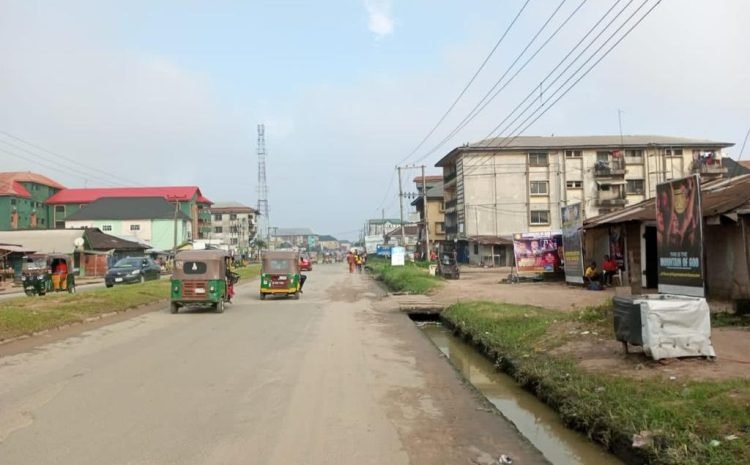 along Ikot Ekpene road by Amy Checkpoint5